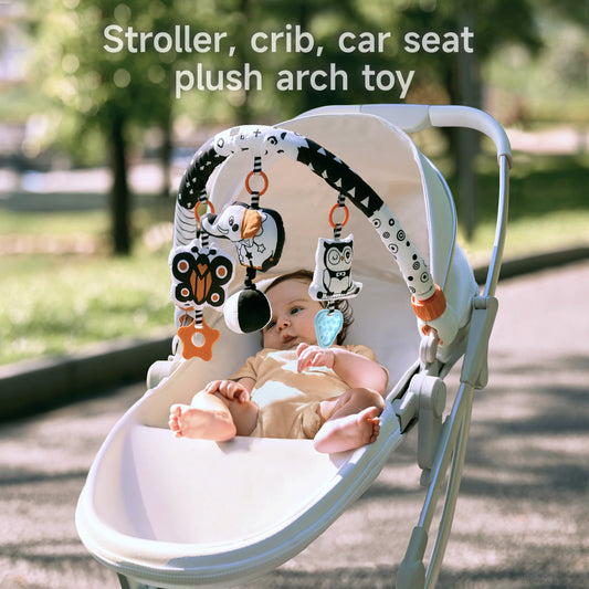 Visual black and white toy for infants with stroller arch and animal characters