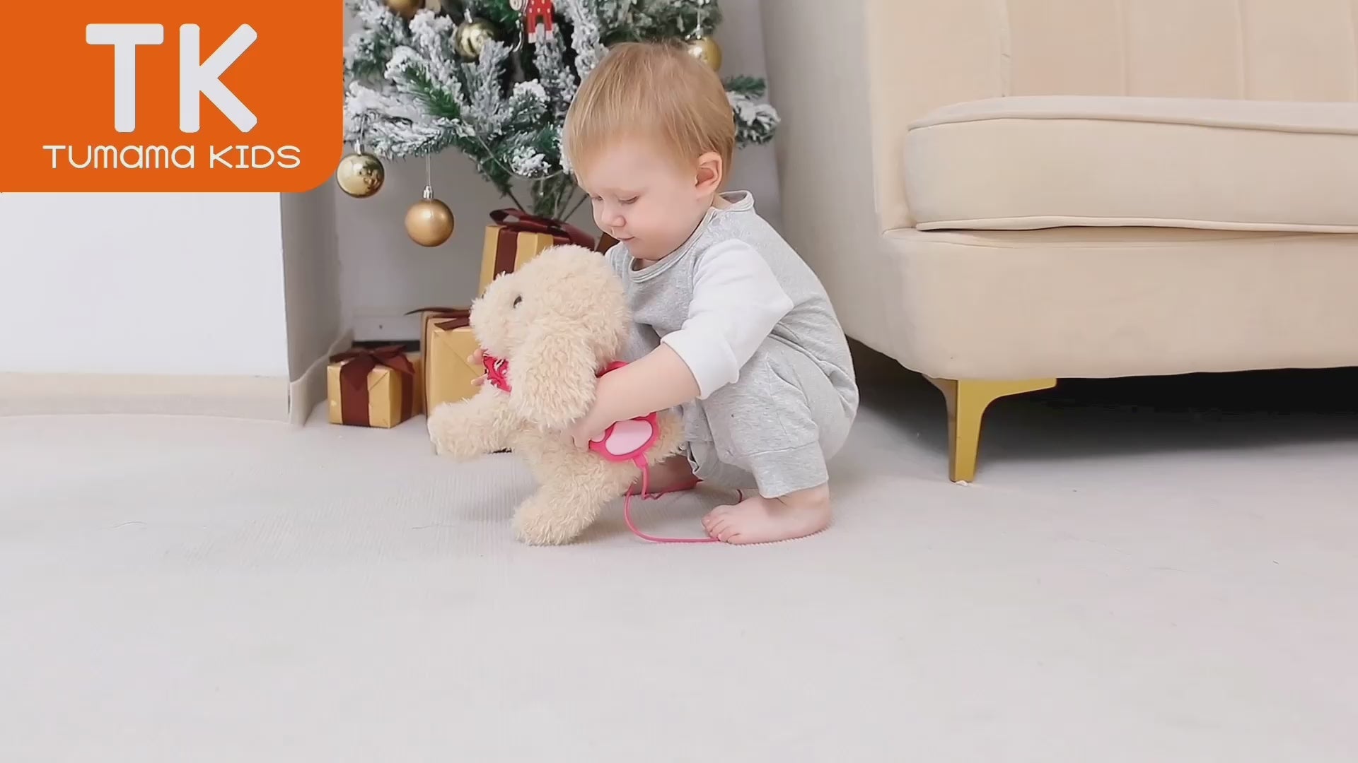 Little-girl-playing-with-electronic-plush-dog-toy-indoors