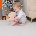 Little-girl-playing-with-electronic-plush-dog-toy-indoors