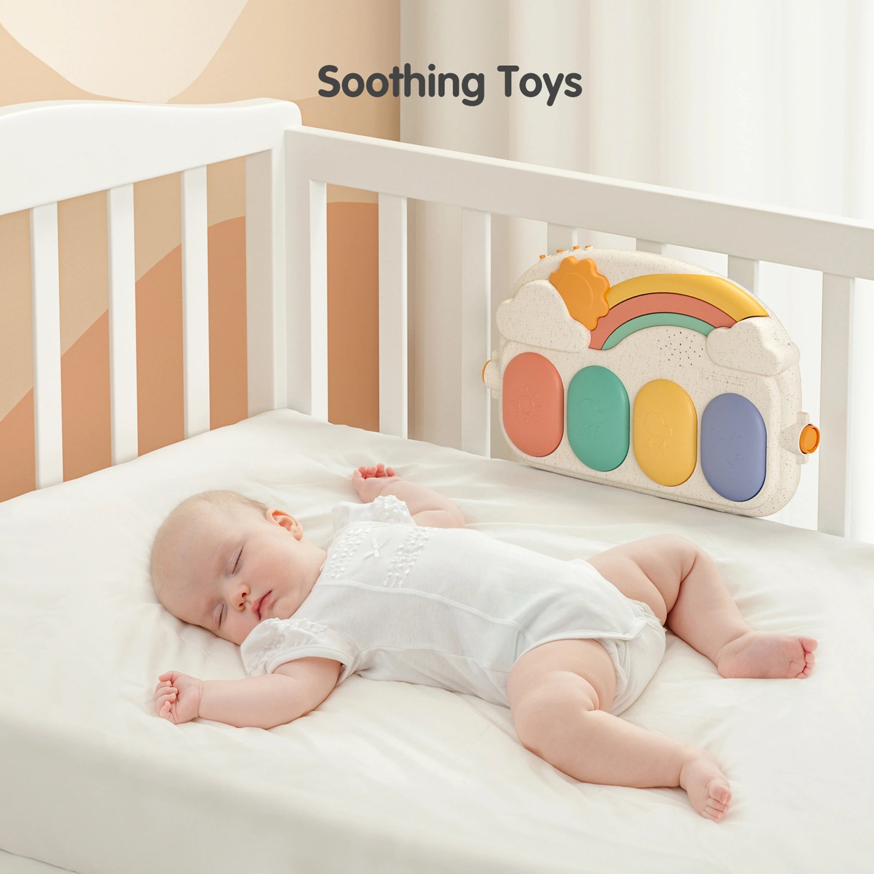 Baby sleeping peacefully in a crib, with the detachable rainbow-themed keyboard from the baby play gym mounted on the crib rail, used as a soothing toy.