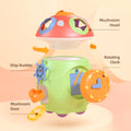 Exploded view of a colorful mushroom-shaped baby toy, showing labeled features including the removable mushroom head, rotating clock, ship rudder, and mushroom door. The image highlights the toy’s interactive parts designed to engage toddlers in imaginative and educational play.