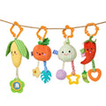 Set of four hanging plush baby rattles and teethers shaped like corn, pumpkin, onion, and chili pepper, each with colorful attachments and orange hooks for hanging.