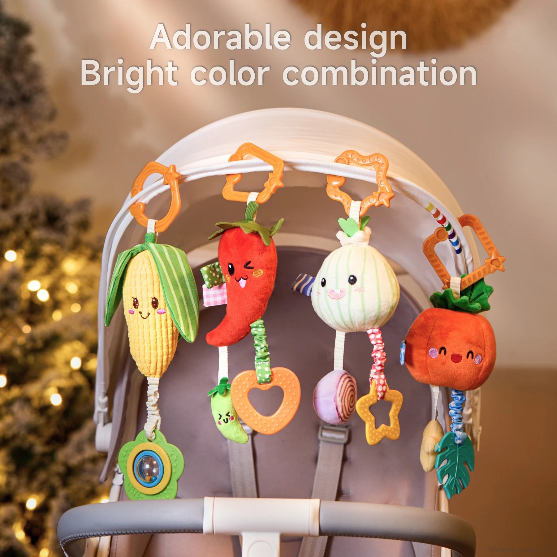 Stroller with four hanging plush baby toys shaped like corn, chili pepper, onion, and pumpkin, featuring bright colors and adorable design for visual stimulation.