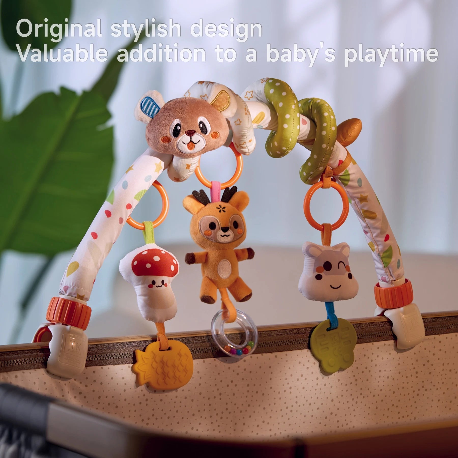 Colorful baby activity arch with original stylish design, featuring plush hanging toys including a bear, deer, mushroom, and cow, securely attached to a playpen, offering a fun and developmental addition to baby's playtime.