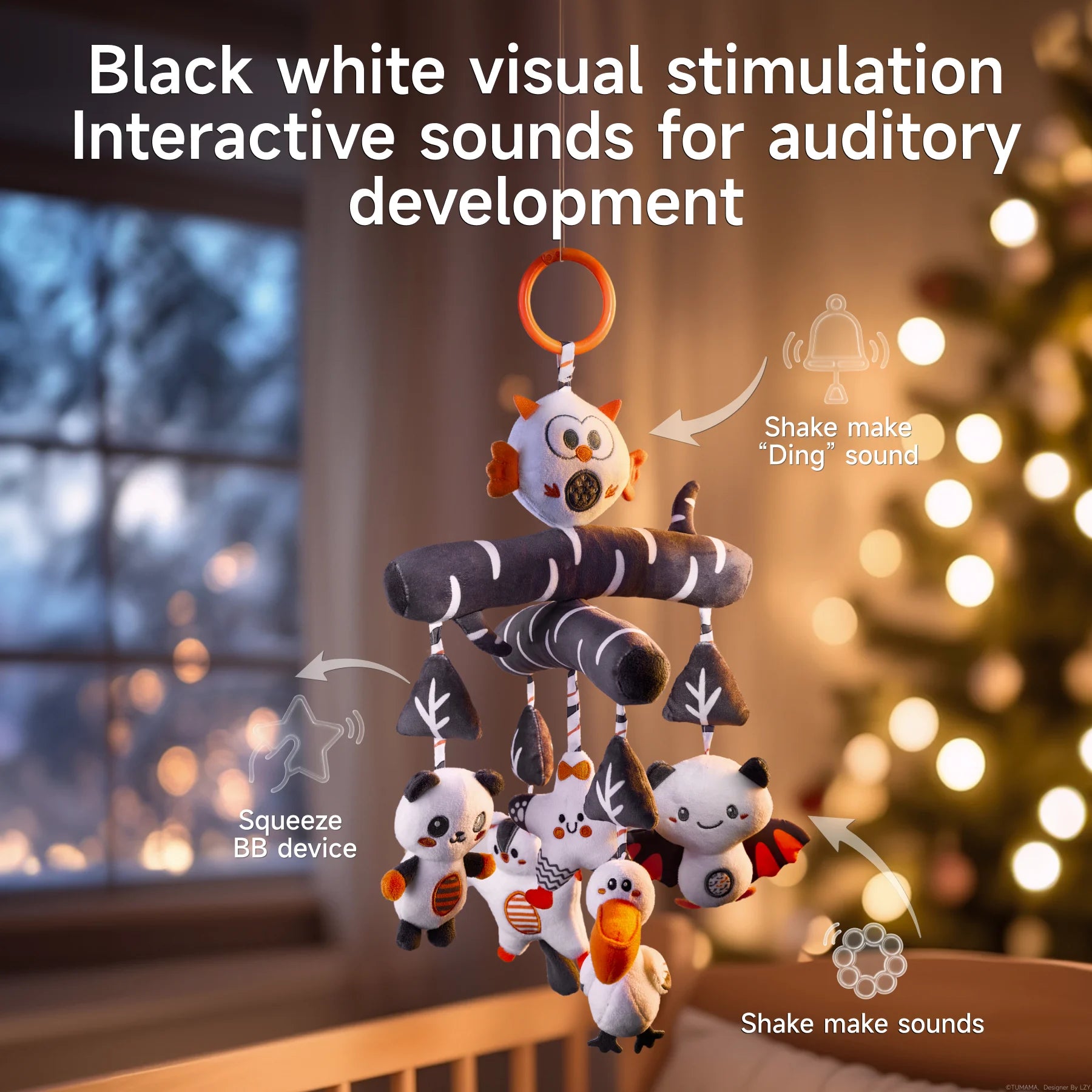 Black-and-white newborn crib mobile hanging by an orange ring in a softly lit nursery, featuring a plush birch-patterned branch with dangling toys (owl, panda, star, pelican, bat); graphic arrows label interactive sound features: shaking the owl produces a ‘Ding’ bell sound, squeezing the star triggers BB rattle noises, and shaking the bat activates additional chime sounds.