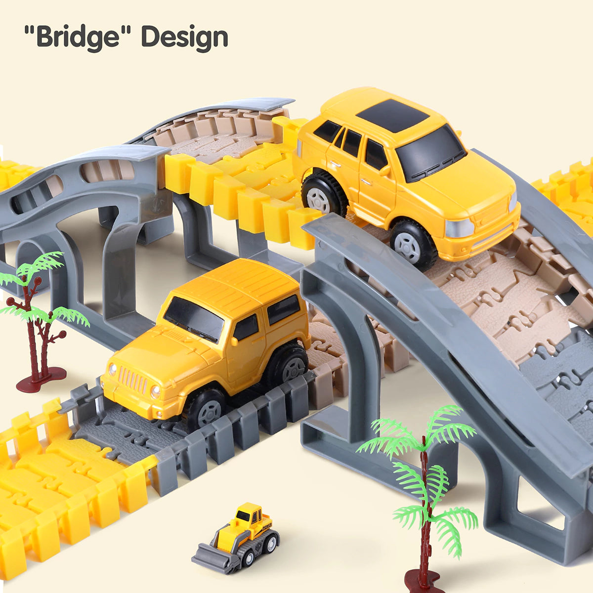 Close-up of a construction-themed toy car track set featuring a gray bridge design. A yellow toy SUV drives across the elevated bridge while another jeep passes underneath. A small bulldozer and palm tree accessories add detail to the play environment. Text on the image reads: “Bridge Design,” highlighting the realistic feature of the toy set.