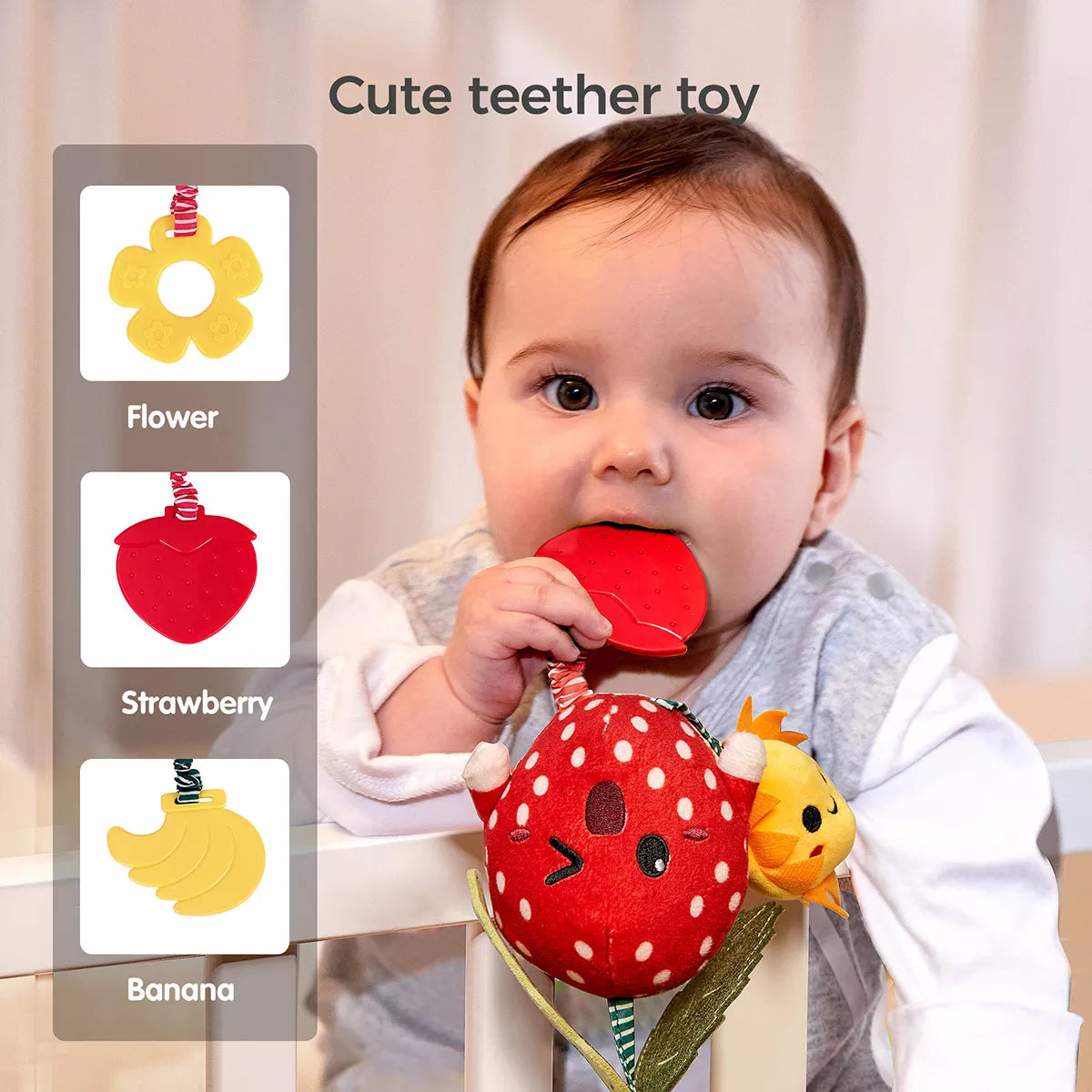 A baby chewing on a red strawberry-shaped teether attached to a plush toy, designed to soothe teething discomfort. On the left, other teether options are shown, including a yellow flower and a banana design. Cute and safe teething toy for infants, combining sensory play with gum relief.