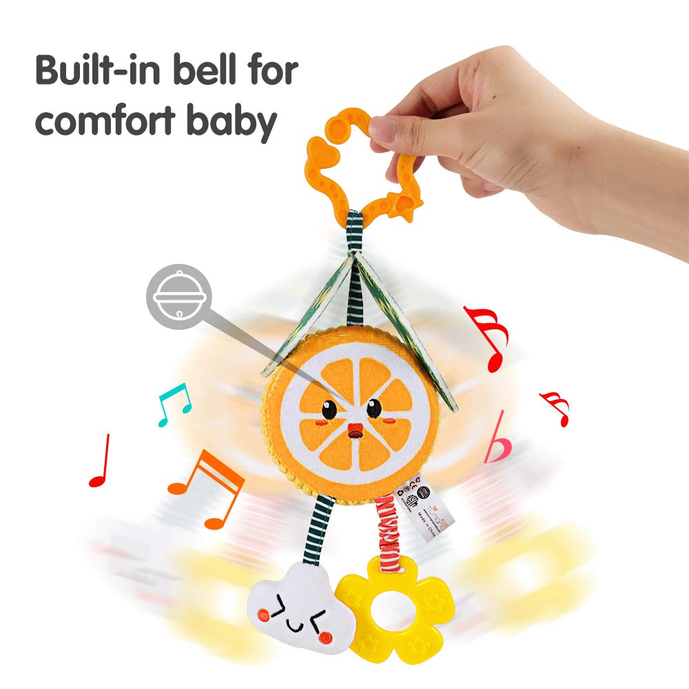 Hand holding a plush orange slice baby rattle toy with a built-in bell. The toy features a smiling cloud and yellow flower teether hanging below. Musical notes illustrate the jingling sound effect, designed to comfort and entertain babies while promoting sensory development.