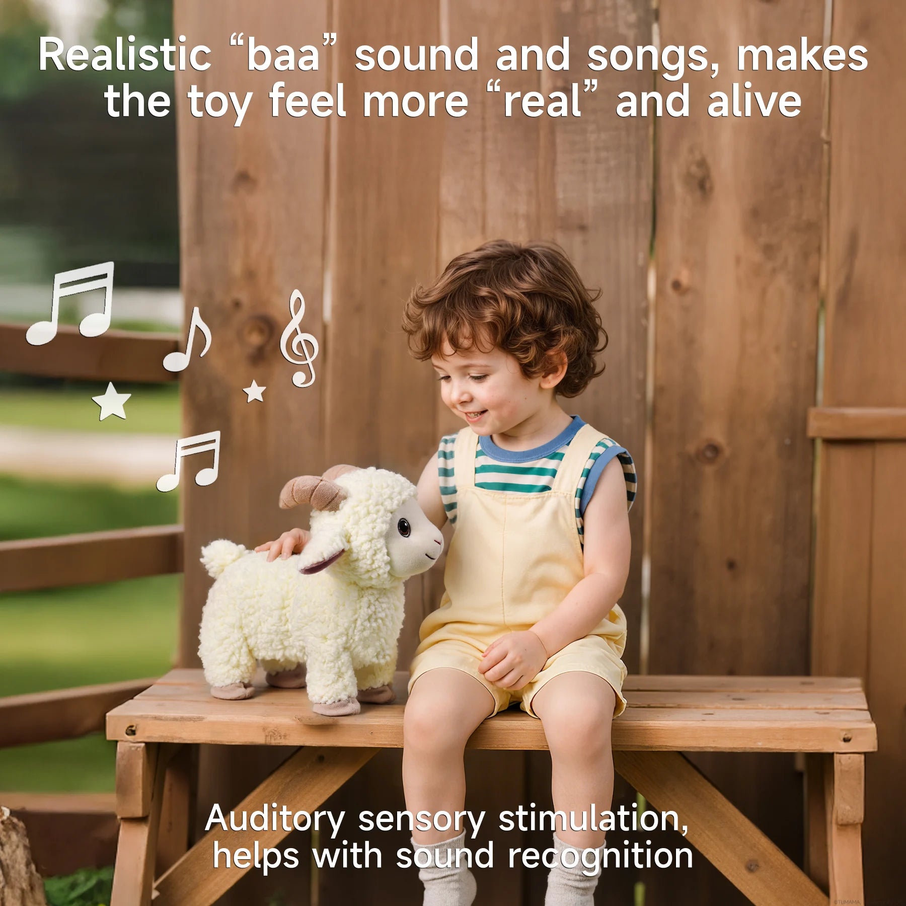 Toddler sitting on a wooden bench smiling at a plush lamb that makes realistic “baa” sounds and plays music; text overlay describes benefits for auditory stimulation and sound recognition.