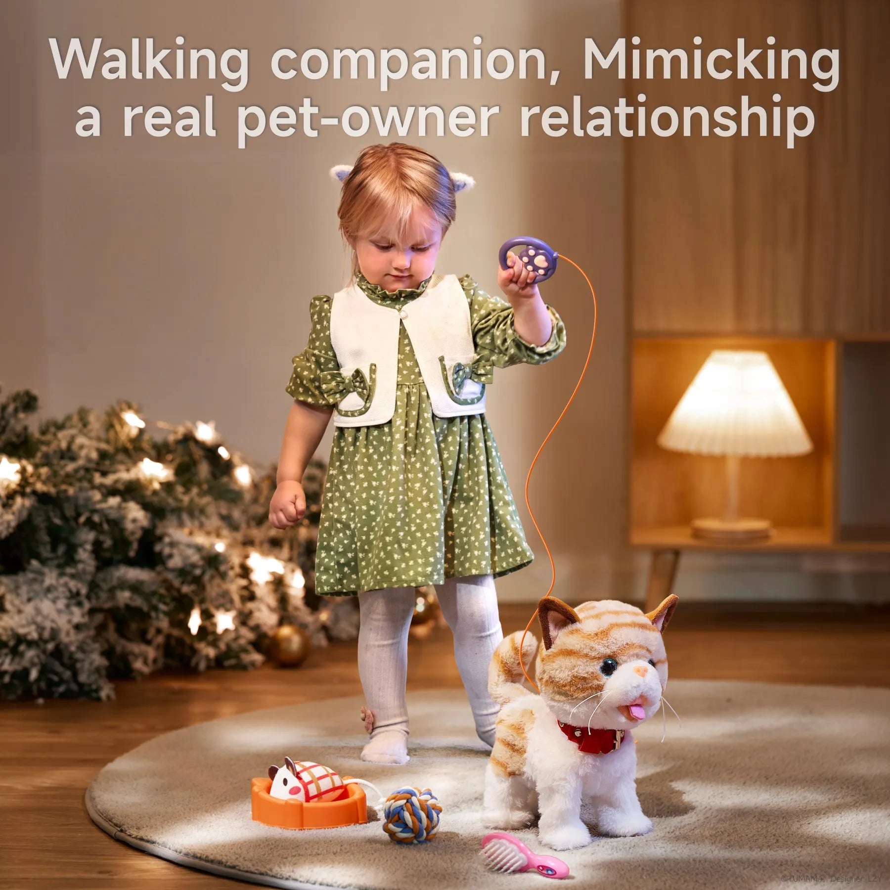 Little girl walking an interactive electric toy cat using a handheld remote, mimicking a real pet-owner bond, with accessories like a toy mouse, food bowl, rope ball, and brush on a rug in a warmly lit festive room.
