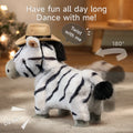 Plush zebra toy wearing a tan cowboy hat, standing on a carpeted floor with its body shown rotating 180 degrees. Motion blur and arrows indicate the toy's twisting dance movement. Text overlays read 'Have fun all day long, Dance with me!' and 'Twist with me,' with 'Da da~' suggesting playful sound effects.