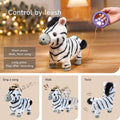 Interactive zebra plush toy controlled by a purple paw-shaped remote with orange leash held by a hand. The top of the image reads 'Control by leash' with instructions: 'Short press - Walk, Next song' and 'Long press - Play after recording'. Below, three labeled sections show the zebra singing with a hat and music notes, walking with motion lines, and twisting with animated tail movement.