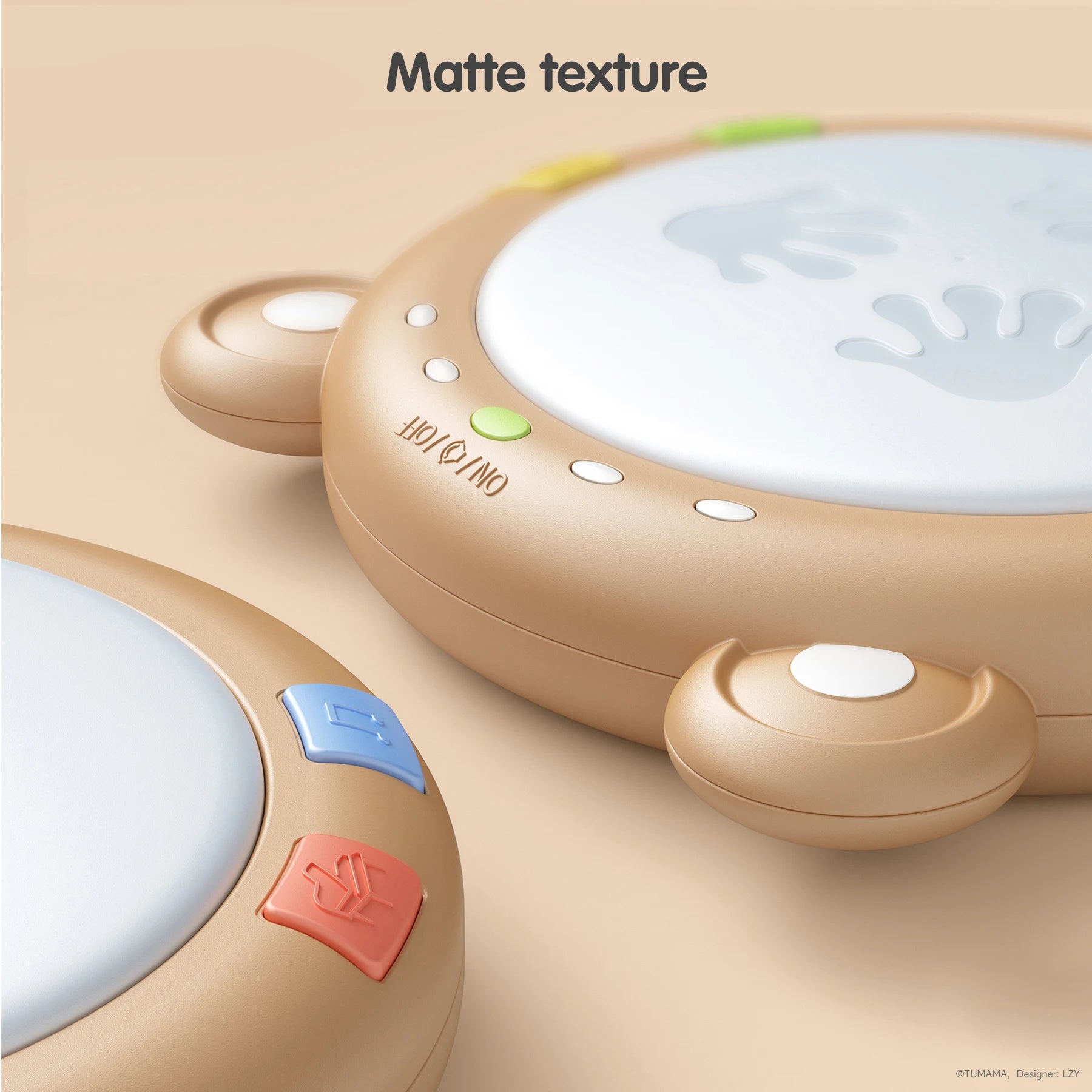 Close-up view of two bear-themed baby drum toys with a smooth matte texture. The surface features colorful buttons, including red, blue, green, and yellow, along with an "ON/OFF" switch and handprint designs on the white drum pad. The text "Matte texture" appears at the top, emphasizing the toy's high-quality finish.