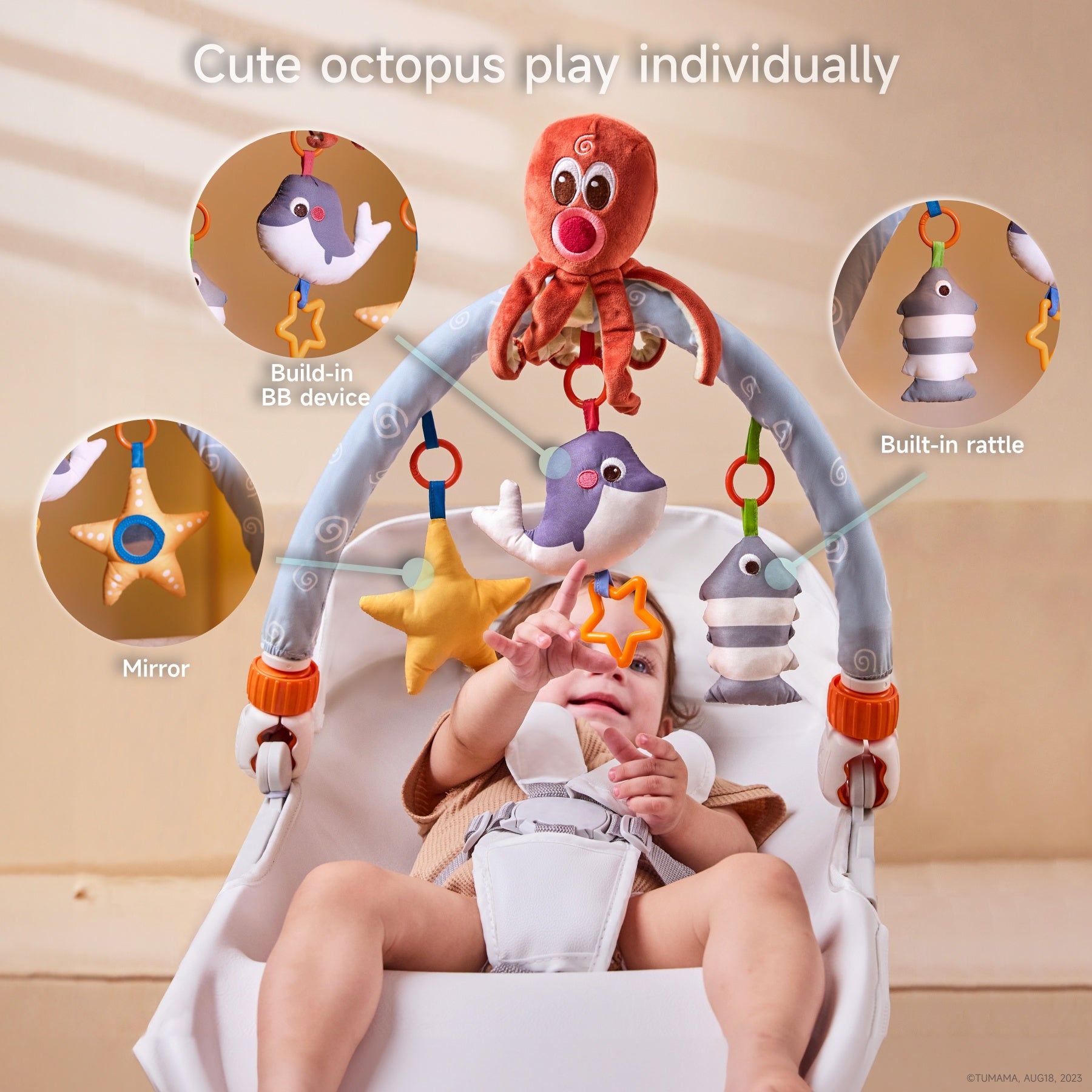 Baby lying in a seat reaching for soft hanging sea animal toys on a toy arch, including a plush octopus, whale with built-in BB device, fish with built-in rattle, and star with mirror; labeled callouts highlight individual toy features.