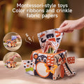 Montessori-style sensory tissue box toy with colorful ribbons and crinkle fabric papers for babies, early learning and fine motor skill development
