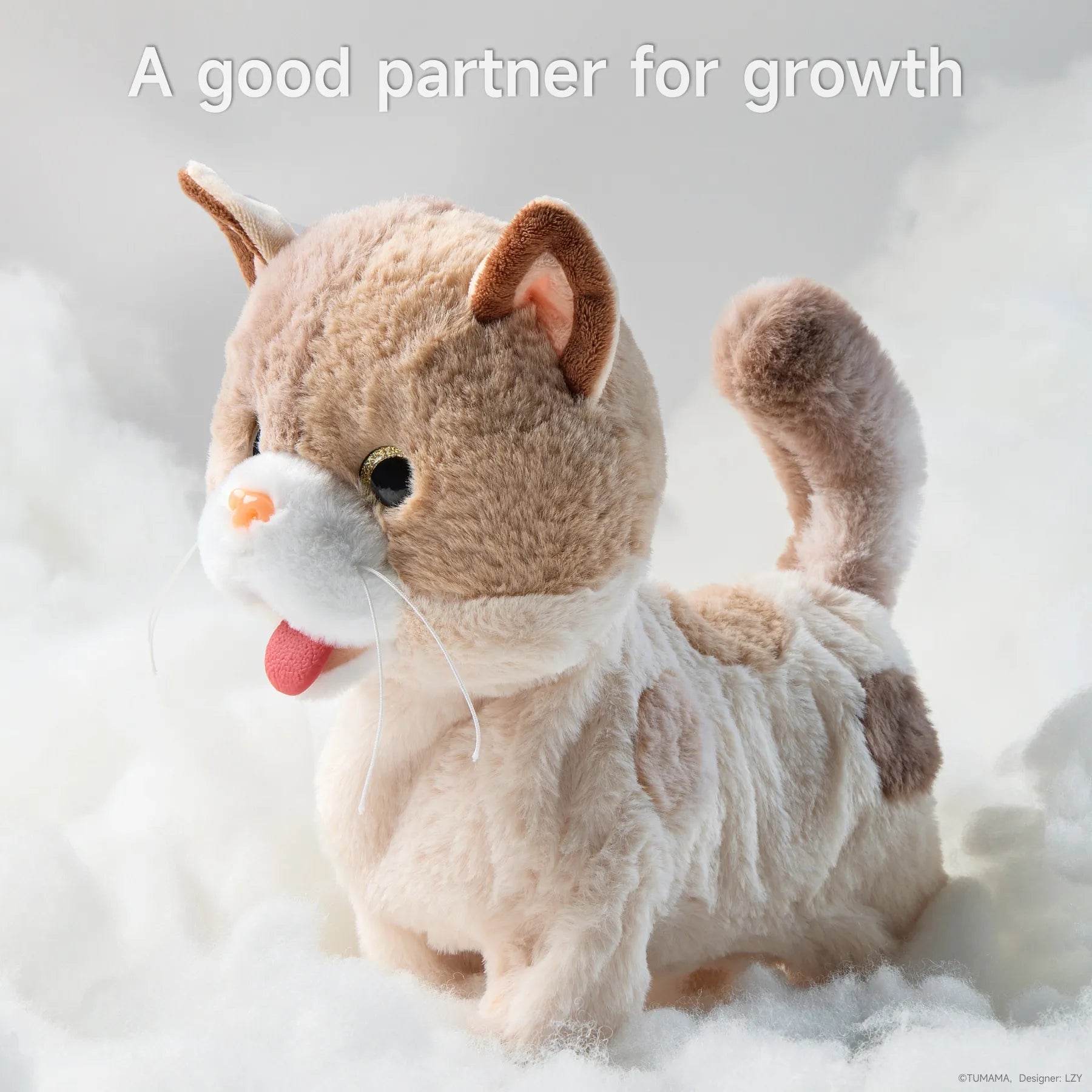 Close-up of a plush electric toy cat with a light brown and white fur pattern, standing on a fluffy white surface with text that reads 'A good partner for growth' above it.