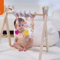 The video shows the Bunny Spiral Car Seat Toy​ with Hanging Rattles Toys installed on the baby gym, and the baby is happily interacting with the toys.